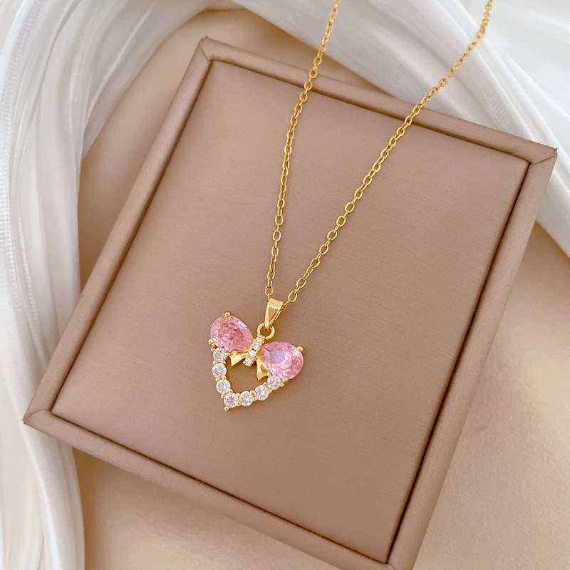 ファッショナブルな高級バタフライノットハートペンダントレディ - Butterfly Clasp Deployant のレビューと価格